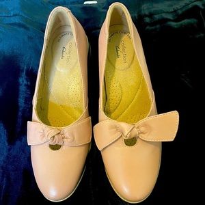 Clark’s rose leather flats.